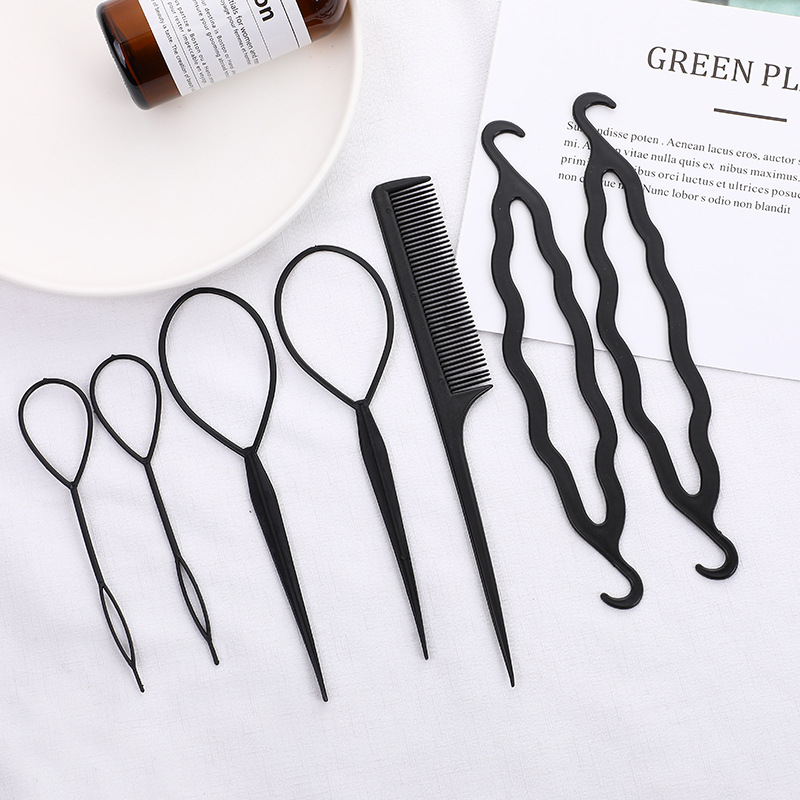 Braided hair travel suit with hair disc, comb, extension needle, and pattern hairdressing tools in compact set