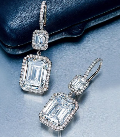 Pair of women's silver dangle earrings with small cube design and zircon accents