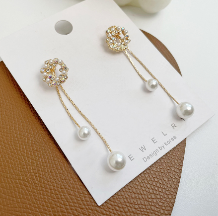 Gold pearl garland stud earrings with rhinestone accents, 2.36 inches long, elegant unisex accessory