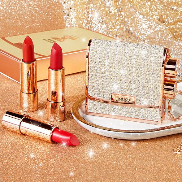 Starry Sky Bright Small Leather Bag Lipstick trio in vintage red, rotten tomato, and berry shades with leather case