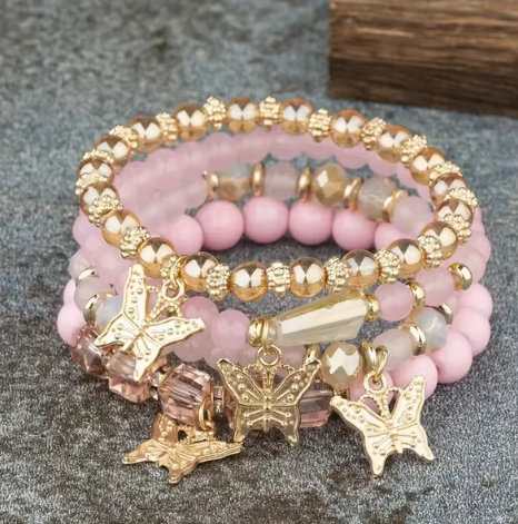 Butterfly charm bead bracelets set with vibrant beads and butterfly motifs